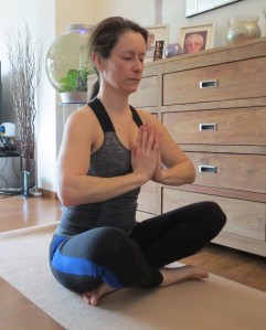 sitting in easy pose sukhasana